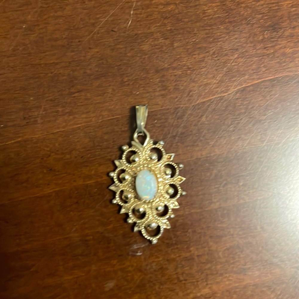 Gold Filigree Pendant Necklace with Opal Center